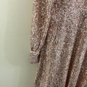 A short pink /silver glitter dress